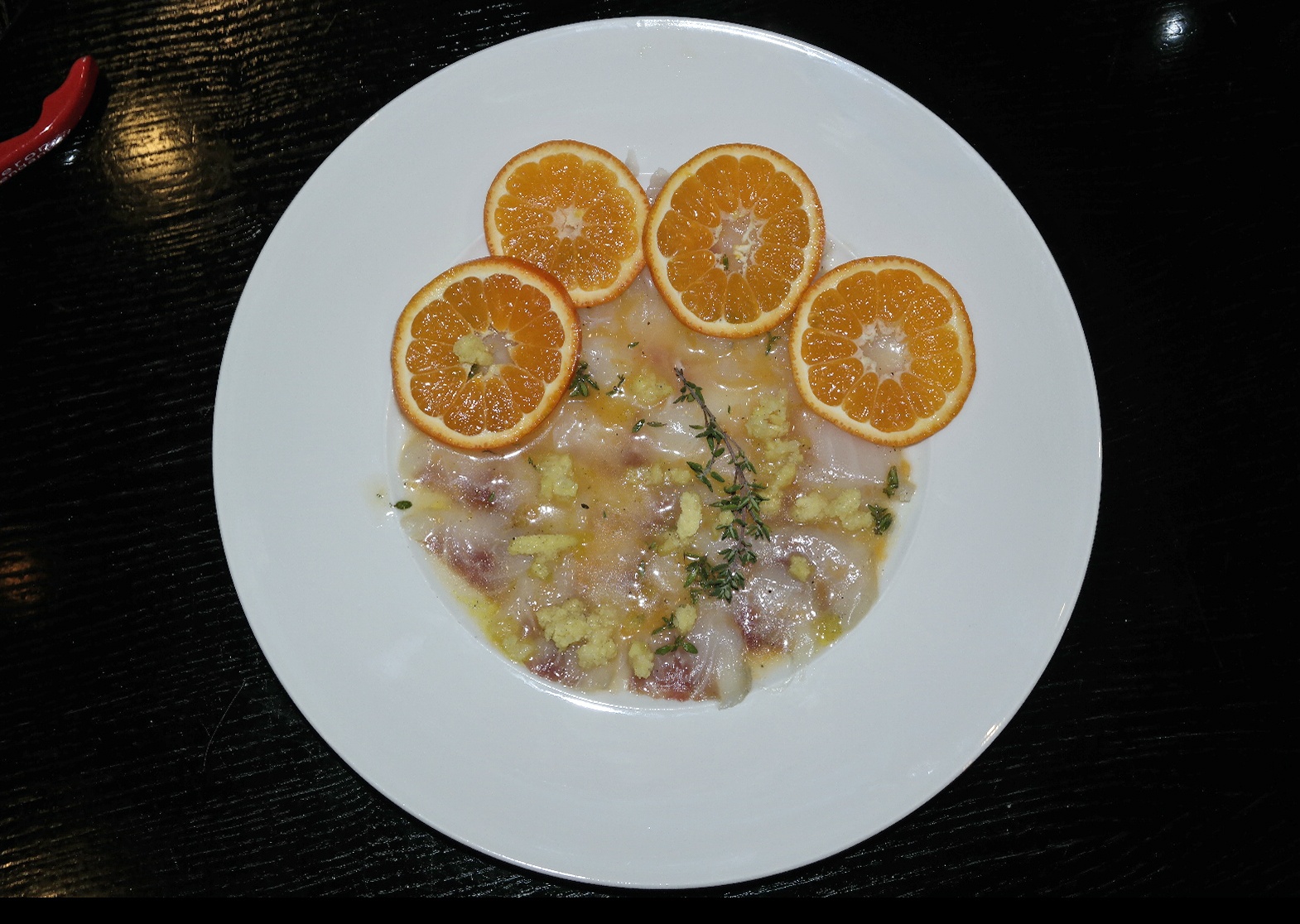 Carpaccio vom Loup de Mer und der Dorade, Clementinen und Lavendelhonig ...