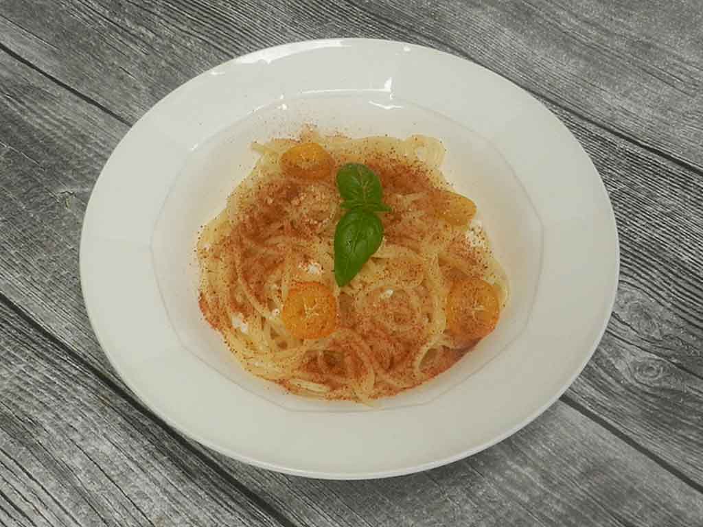 Pasta mit Kumquats und Ricotta.